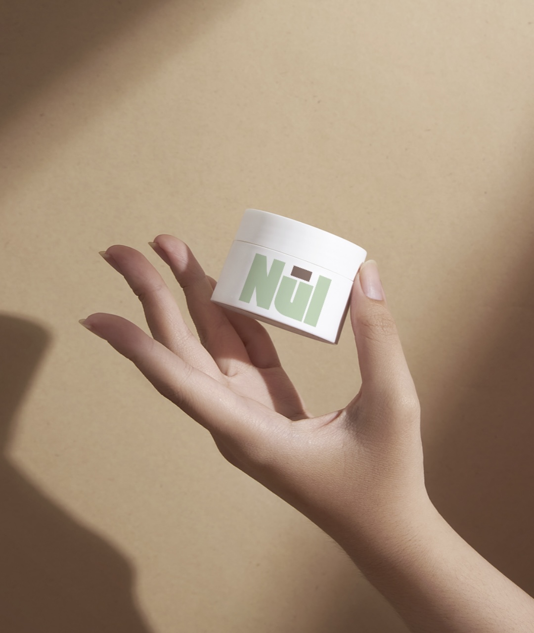 NūI jar held in hand